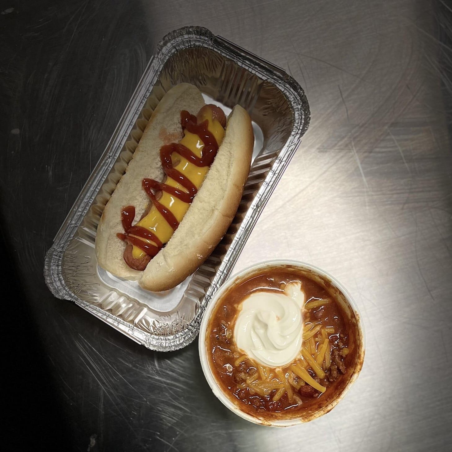 hot dog and cup of chili